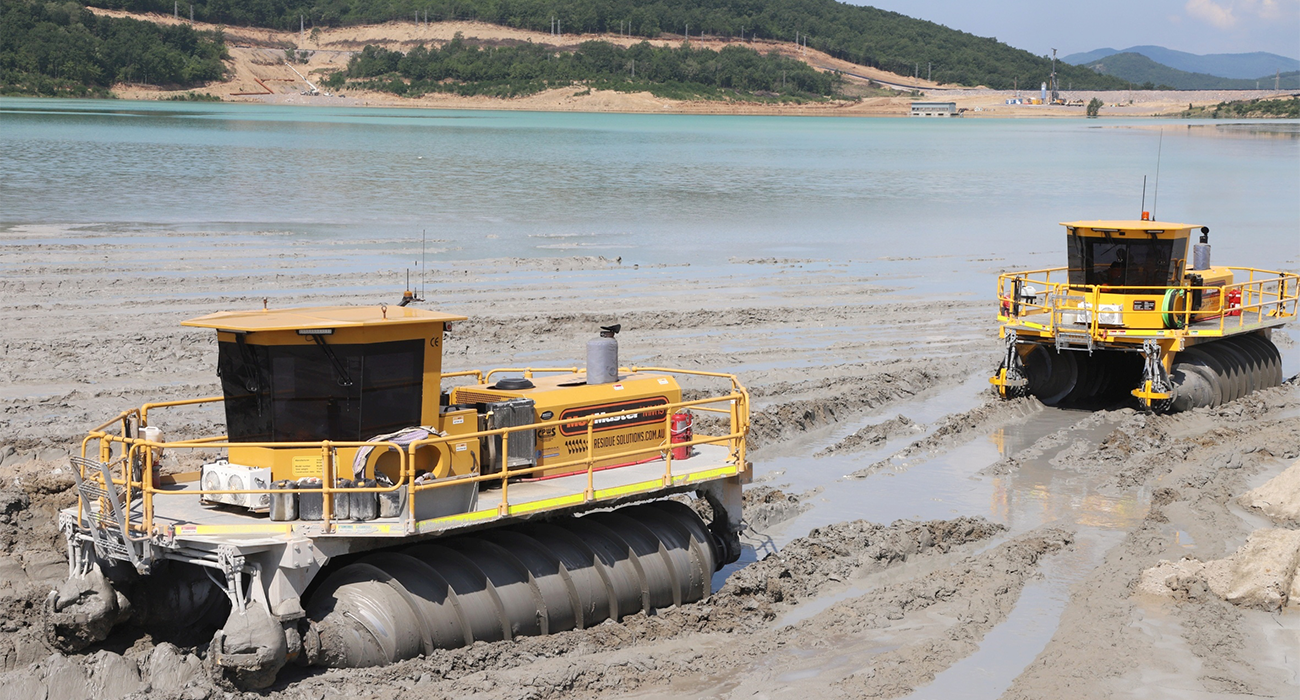 Two MudMaster machines in tailings pond.